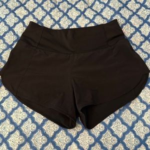 Athleta: black “just run with it” shorts Size: xxs, 3” inch